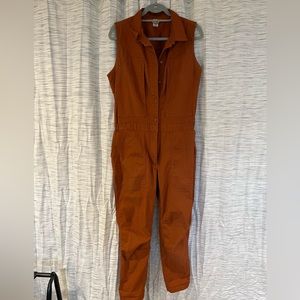 Burnt Orange sleeveless work jumpsuit.